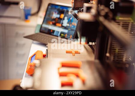 3D print project lab. Home studio. Computer screen with stl object. Stock Photo