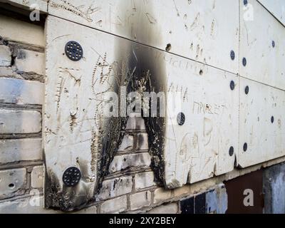 Traces of flame on the foam wall covering Stock Photo