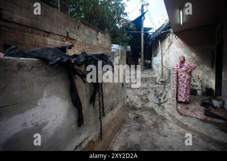 Tulkarm, Palestine. 27th Aug, 2024. Palestinians inspect the damage caused by Israeli air strikes on the Nour Shams refugee camp. The Israeli Air Force bombed a building in the Nour Shams refugee camp, destroying several nearby homes and streets and killing five young men. (Photo by Nasser Ishtayeh/SOPA Images/Sipa USA) Credit: Sipa USA/Alamy Live News Stock Photo