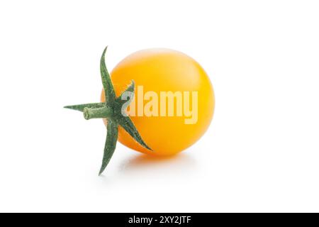 Yellow cherry tomatoes isolated on a white background. Stock Photo