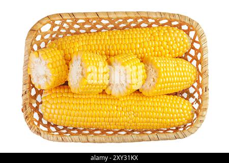 ear of corn in a wicker basket isolated on a white background. Top view. Flat lay. Stock Photo