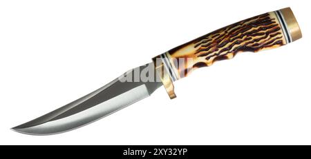 Long steel blade on a fixed blade knife with a handle that looks like bone that is ideal for survival or use in the outdoors when hunting, fishing or Stock Photo