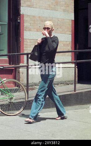 Carolyn Bessette Kennedy leaving her Tribeca loft on 20 North Moore Street to catch a taxi to her doctor's office on the Upper West Side in New York City on June 11, 1997.  Photo Credit: Henry McGee/MediaPunch Stock Photo