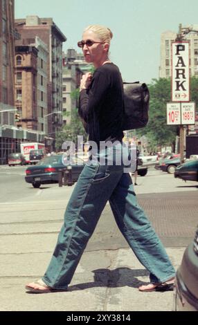 Carolyn Bessette Kennedy leaving her Tribeca loft on 20 North Moore Street to catch a taxi to her doctor's office on the Upper West Side in New York City on June 11, 1997.  Photo Credit: Henry McGee/MediaPunch Stock Photo