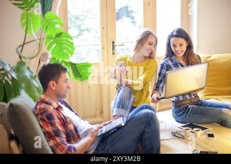 Business people conversation with technology at hand. Exchange of new ideas and brainstorming between colleagues Stock Photo
