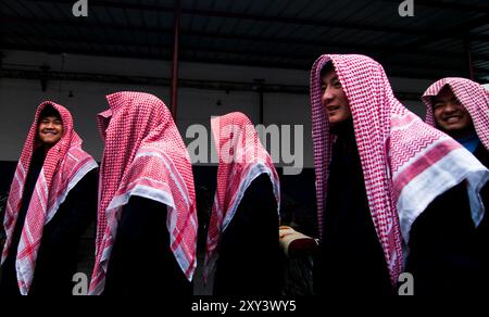 Madrassa students wearing Arabian Kkeffiyeh in Linxia, Gansu province, China. Stock Photo