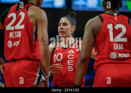 Arlington, Texas, USA. 27th Aug, 2024. Las Vegas Aces guard KELSEY PLUM (10) discusses a play with teammates during a WNBA game between the Las Vegas Aces and Dallas Wings at College Park Center. Wings win 93-90. (Credit Image: © Mark Fann/ZUMA Press Wire) EDITORIAL USAGE ONLY! Not for Commercial USAGE! Stock Photo