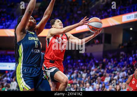 Arlington, Texas, USA. 27th Aug, 2024. Las Vegas Aces guard KELSEY PLUM (10) hits a layup during a WNBA game between the Las Vegas Aces and Dallas Wings at College Park Center. Wings win 93-90. (Credit Image: © Mark Fann/ZUMA Press Wire) EDITORIAL USAGE ONLY! Not for Commercial USAGE! Stock Photo