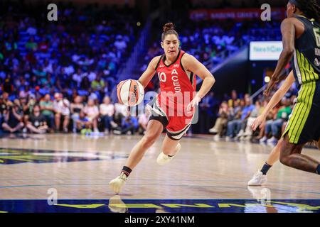 Arlington, Texas, USA. 27th Aug, 2024. Las Vegas Aces guard KELSEY PLUM (10) handles the ball during a WNBA game between the Las Vegas Aces and Dallas Wings at College Park Center. Wings win 93-90. (Credit Image: © Mark Fann/ZUMA Press Wire) EDITORIAL USAGE ONLY! Not for Commercial USAGE! Stock Photo