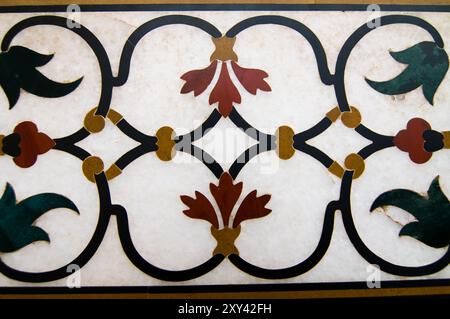 Semi precious stone decoration on the ivory-white marble of the lower walls of the Taj Mahal, Agra, India. Stock Photo