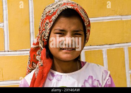 Portrait of an Uyghur girl taken in the old city of Kashgar, Xinjiang, China. Stock Photo