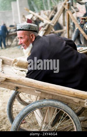 Portrait of an Uyghur man taken in the old city of Kashgar, Xinjiang, China. Stock Photo