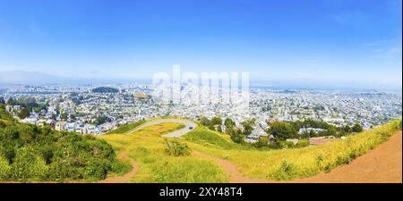 High angle aerial view panorama of downtown San Francisco cityscape, buildings from atop the hill of Twin Peaks offering sweeping views of the city an Stock Photo