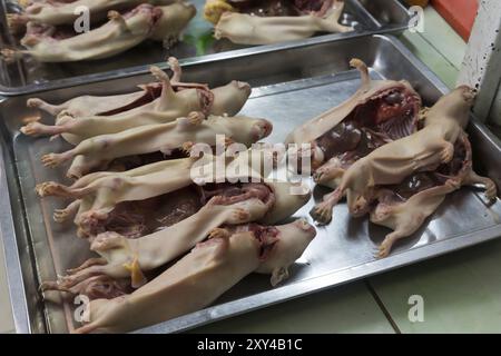 Photograph of slaughtered guinea pigs on the local market in Huaraz, Peru, South America Stock Photo