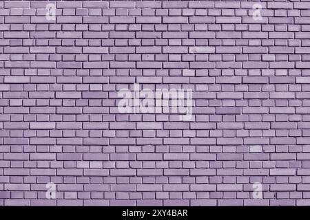 Crocus Petal colored brick wall background Stock Photo