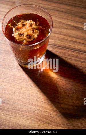 A cup of brewed monk fruit drink, a traditional Chinese medicine Stock Photo