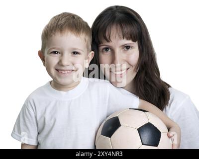 Black white football or soccer sport ball in hand Stock Photo