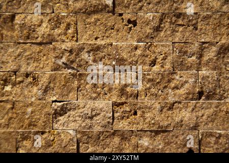 Rectangular cut out beige organic marble wall texture background can be, tile seamless lined up Stock Photo