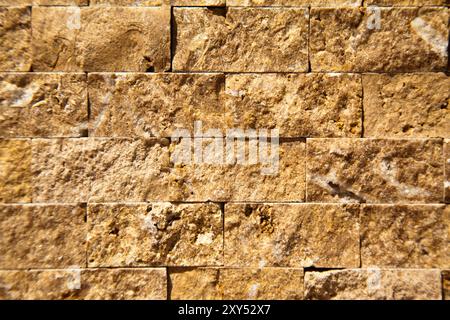 Rectangular cut out beige organic marble wall texture background can be, tile seamless lined up Stock Photo