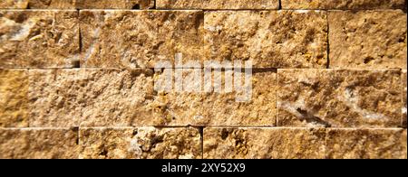 Rectangular cut out beige organic marble wall texture background can be, tile seamless lined up Stock Photo