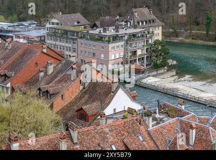 Weir over the River Aare in Old Town, Bern, Switzerland. shot from the Münsterplattform - a raised viewing platform with formal garden. Stock Photo
