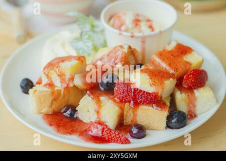 Strawberry Honey toast with fresh mix berries Stock Photo