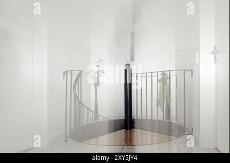 The upper entrance to a spiral staircase Stock Photo