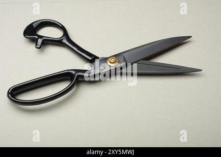 A pair of black scissors isolated on a white background Stock Photo