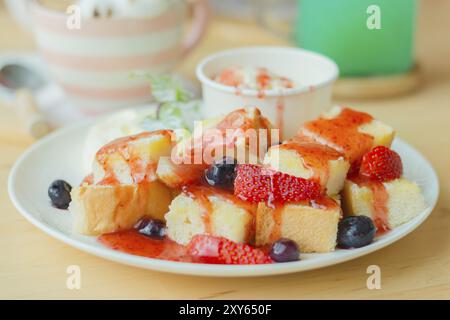 Strawberry Honey toast with fresh mix berries Stock Photo