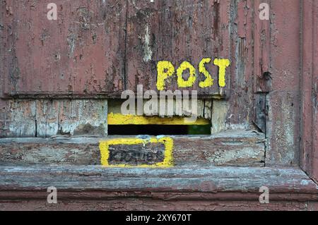 Letterbox on an abandoned old condemned house in Magdeburg Stock Photo