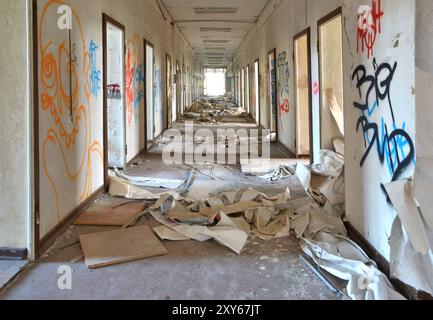 A long corridor in a disused office building Stock Photo