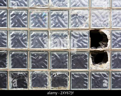 Destroyed window on the facade of a disused derelict factory in Magdeburg Stock Photo