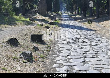 Fragments of the grave stone, pavement, perspective of the road Stock Photo