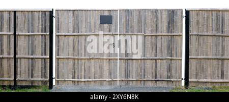 Japanese style rustic fence made from dry bamboo. Isolated on white Stock Photo