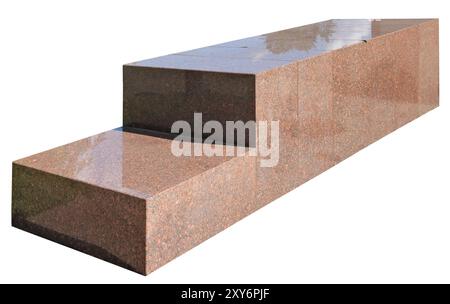Seven large polished granite blocks are glued together. Isolated on white Stock Photo