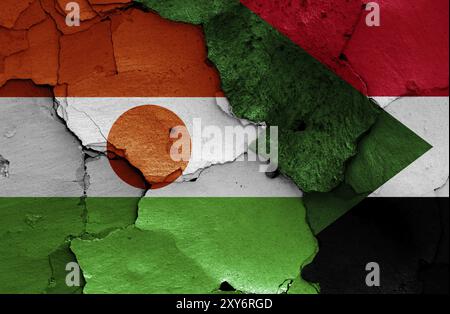 Flags of Niger and Sudan painted on cracked wall Stock Photo