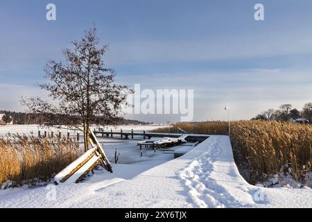 Winter on the Prerow Current with snow Stock Photo