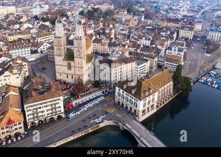 Zurich, Switzerland: Aerial drone view Zurich old town city center along the Limmat river with the Grossmunster cathedral in Switzerland largest city. Stock Photo