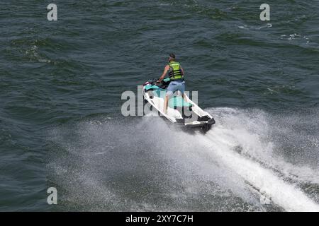 Amphibious water scooter, jetski riding on the Saint Lawrence River, Montreal, Province of Quebec, Canada, North America Stock Photo