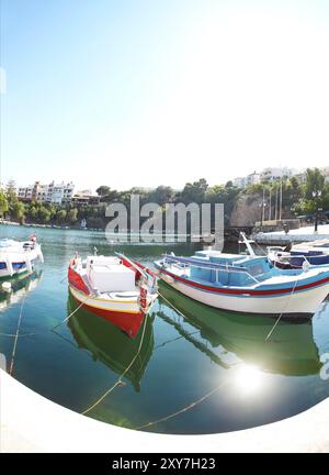 Boats at Voulismeni lake in Agios Nikolaos. Crete, Greece, Europe Stock Photo