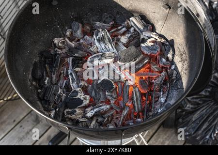 Glowing hot coal in a barbeque Stock Photo