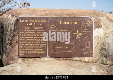 Tropic of Capricorn information sign next to a road in Kruger National Park, South Africa, Africa Stock Photo