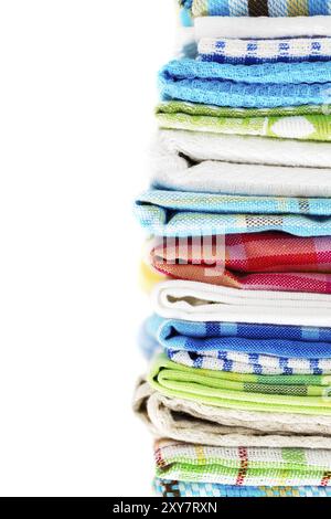 Pile of linen kitchen towels isolated on white background Stock Photo