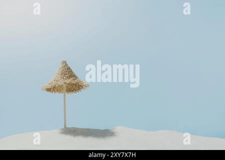 Vacation, beach, travel, relaxation concept. Symbolic background with beach sand, mini sun lounger, blue sky, clouds, sea or ocean. Minimalism with co Stock Photo