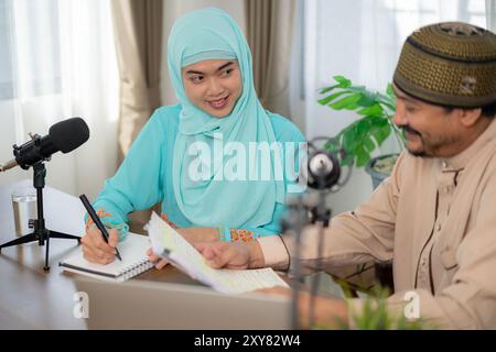 Interview and discussion between a blogger or broadcasting a podcast. Stock Photo