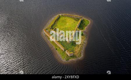 Lochindorb Loch late summer the medieval Lochindorb Castle ruins and walls on an island in the centre of the loch Stock Photo