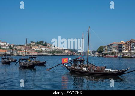 Rabelo boats along the waterfront, Vila Nova de Gaia, Portugal. Stock Photo