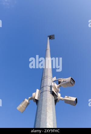 Security Cameras Mounted on Tall Pole Stock Photo