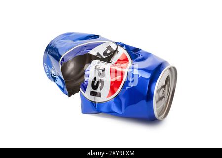 Chisinau, MOLDOVA - August 28, 2024: Crushed aluminum soda can with Pepsi logo isolated on white. Opened empty crumpled can of famous soft drink brand Stock Photo