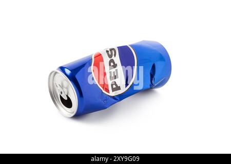 Chisinau, MOLDOVA - August 28, 2024: Crushed aluminum soda can with Pepsi logo isolated on white. Opened empty crumpled can of famous soft drink brand Stock Photo